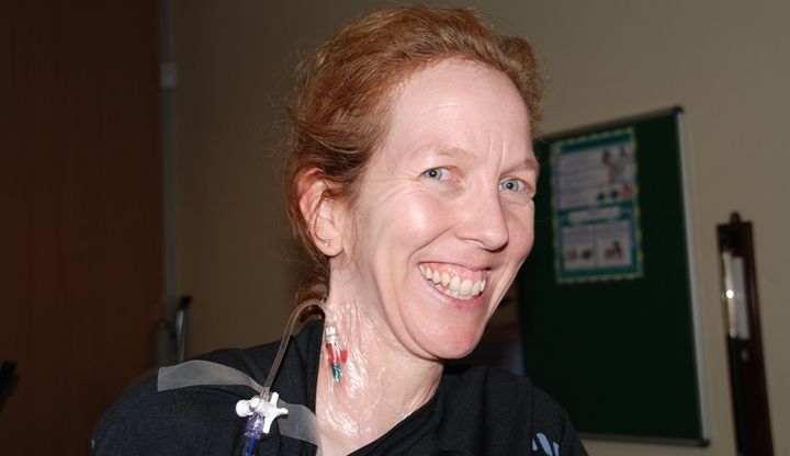 Paula Meale shows off her central venous catheter