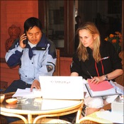 Mingma Sherpa and Denny Levett on the terrace of the Summit Hotel