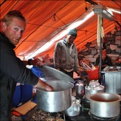 Jimmy Carrol getting some hot water from the cook tent