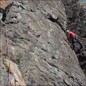 David leading pitch 2 of Astral Blue Mod 70m First Zawn North FA 30