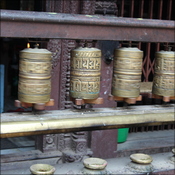 Prayer wheels in the golden palace