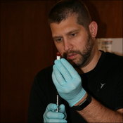 Brad preps blood for testing