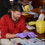 Tim prepping blood samples for testing