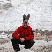 Nigel with bunny ears in front of ice fall